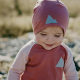 Baby in merino wool beanie hat and Crew Neck Top Base Layers Wildhaven Wools