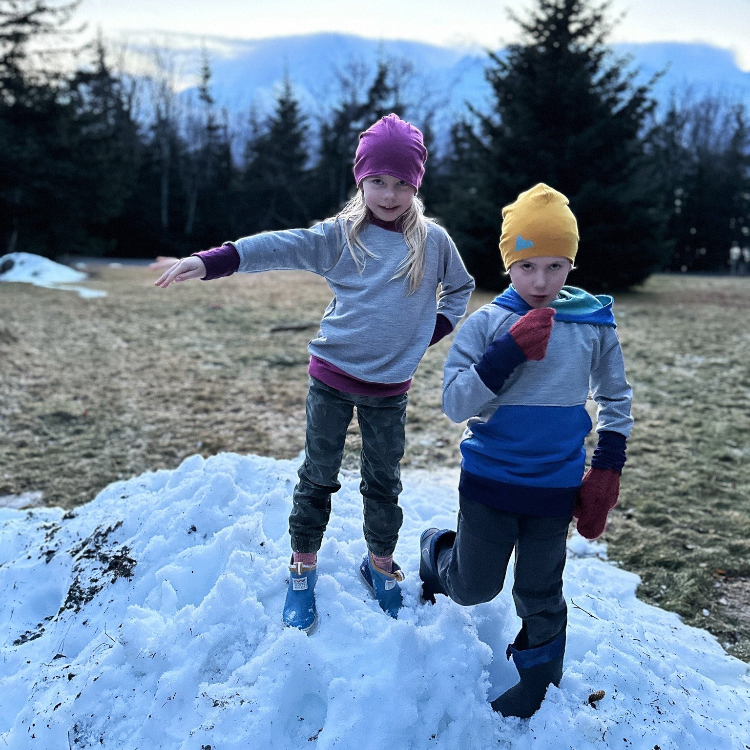 Two kids wearing Kids Ultra Cozy Crew Tops and Hoodies outside