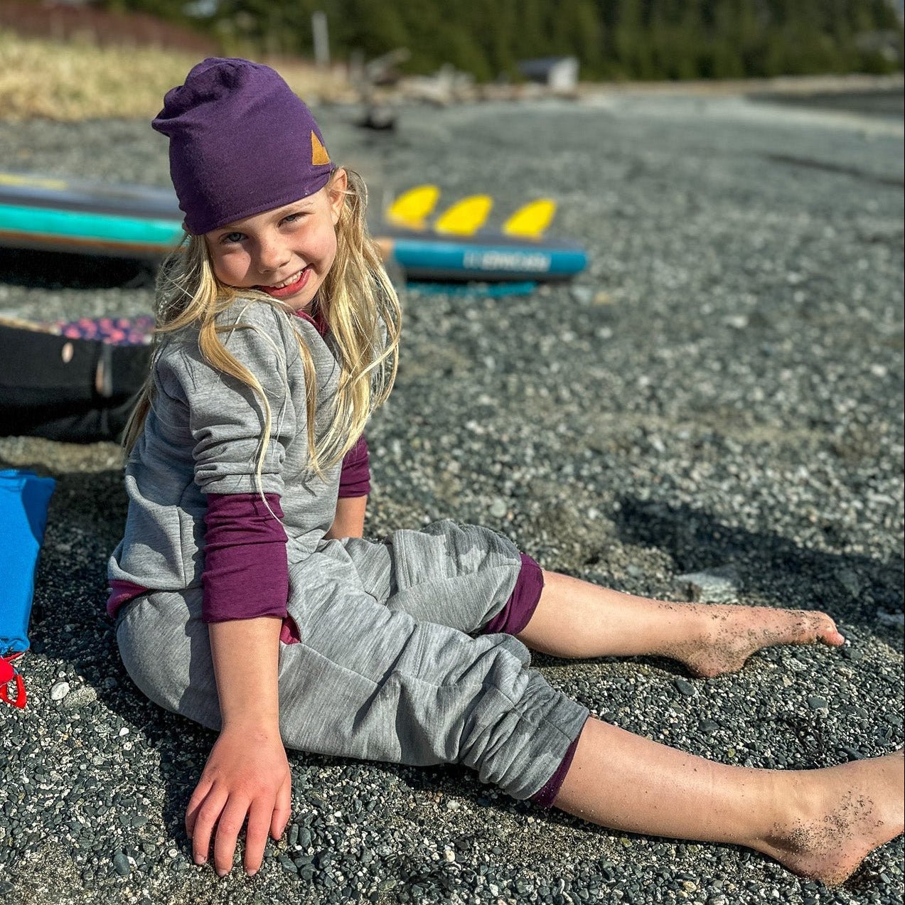 Child wearing Ultra Cozy Crew + Jogger Set in Berry outdoors