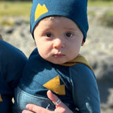 Baby in teal blue cozy Merino Wool Beanie Hat and kids merino wool hoodie made in Alaska by Wildhaven Wools